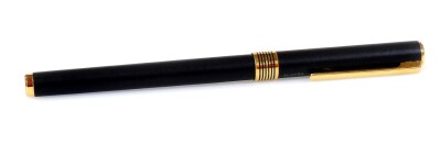 An Aurora Marco Polo fountain pen, in black with gilt coloured banding and clip, open nib, 14cm W.