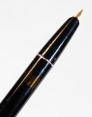 An Aurora 88 fountain pen, marked 88p, in black with chrome coloured banding, gilt coloured clip and lid and black circle to the top, 13cm W. - 2