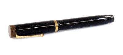 A Parker Duofold Lucky Curve fountain pen, in black with gilt banding and clip, with named nib, marked 14k, 15cm W.