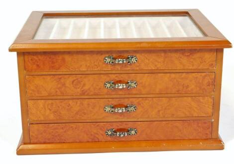 A modern burr finish pen casket, of rectangular form, with perspex top and four drawers on a plain base, 16cm H, 9cm W, 22cm D.