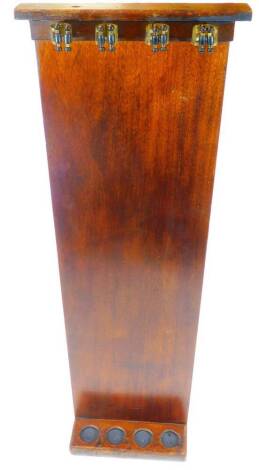 A mahogany framed cue stand, with shaped section beneath four sections to hold cues, 92cm H, 31cm W, 10cm D.