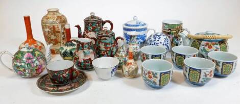 Various oriental china, Chinese famille rose teapot, 10cm H, profusely decorated with various flowers, a carpet bowl, Japanese coffee pot, Kutani vase, various other oriental china, etc. (a quantity)