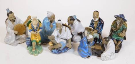 Various oriental glazed pottery figures, of elderly gentleman, etc. one playing musical instrument, 17cm H, etc. (a quantity)