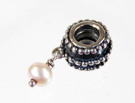 A Pandora charm, of drop design, with three row beaded top section and single pearl drop, stamped 925 ALE, 2.3g all in.