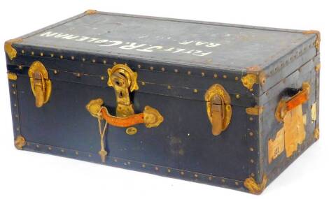 A 20thC metal sea chest, with studded sides, leather handles and partial luggage labels, 33cm H, 79cm W, 43cm D.