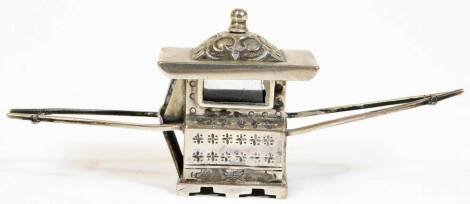 A Chinese 19thC miniature sedan chair, with extended handles, the carriage with repousse decoration, impressed Chinese maker's mark, white metal, unmarked, 8cm W.