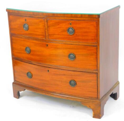 A 19thC mahogany bow front chest, of two short and two long drawers, each with octagonal plate handles on bracket feet, 93cm H, 88cm W, 46cm D.