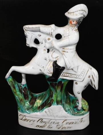 A 19thC Staffordshire pottery equestrian figure, William III Enniskillen group, polychrome decorated predominantly in green and brown, with gilt highlights, 37cm H. (AF)