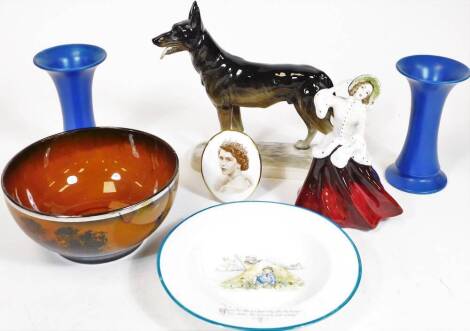 Miscellaneous items, to include a Aynsley child's bowl decorated with the nursery rhythm Little Boy Blue, an Arthur Boker porcelain figurine, an Elizabeth II Coronation plaque, a pair of blue glazed vases, a Ridgway Series ware bowl, etc.