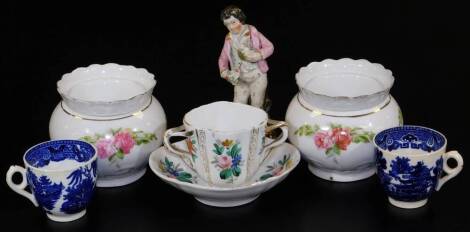 Various porcelain 18thC and others, a Willow pattern cup, 6cm H, another similar, continental porcelain two handled cup and saucer, continental figure of a boy holding bird's nest, polychorme decorated, etc. (a quantity)