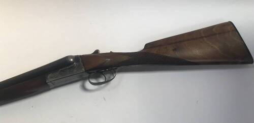 A Spanish 12 bore side by side shotgun, by Lauron, serial number 93936. Auctioneer's note: to purchase this lot you must have a current and valid shotgun certificate.