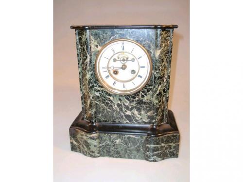 A Victorian slate and marble case mantel clock