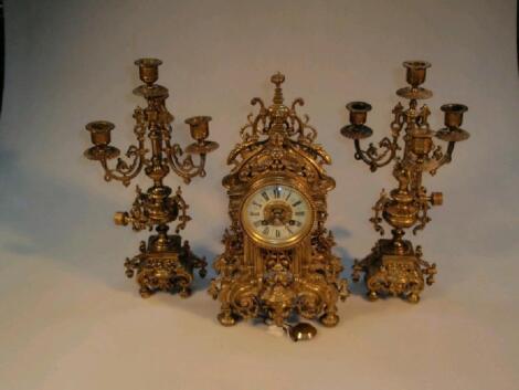 A 19thC French gilt brass clock garniture