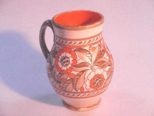 A Charlotte Rhead Pottery 'Tudor Rose' jug