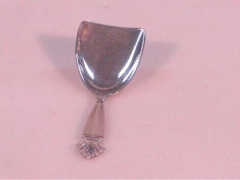 A Georg Jensen silver acanthus pattern caddy spoon with scoop handle