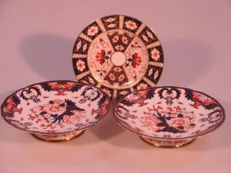 A pair of Royal Crown Derby pedestal comports decorated in the Imari palette