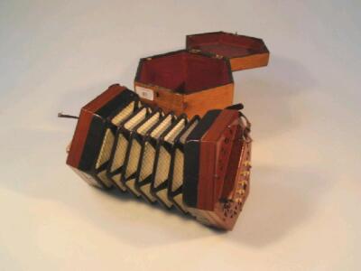 A Lachenal & Co patent concertina with mahogany ends