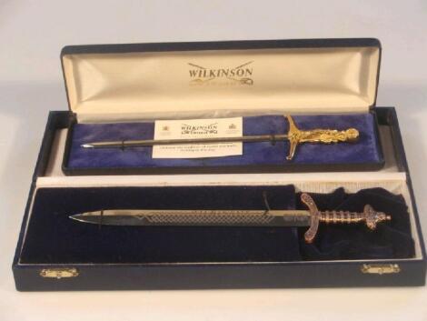 A Wilkinson Sword miniature replica of the Millennium Sword