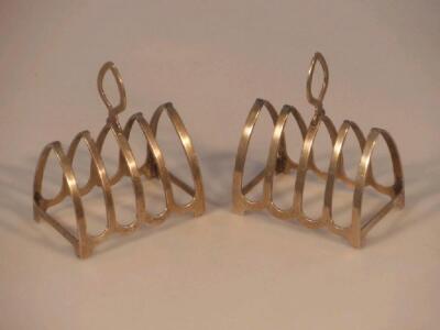 A pair of George V silver five-bar toast racks