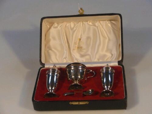 A modern silver cruet set by Viners