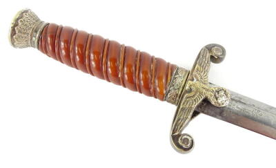 A German Third Reich Army Officers dagger, 1935 pattern, the blade stamped for Gebruder Heller and with balloon man emblem, with a plated scabbard, eagle and swastika guard and Bakelite handle, 40cm long.