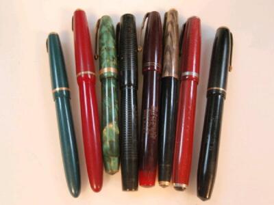 A quantity of vintage fountain pens including Mabie Todd Blackbird