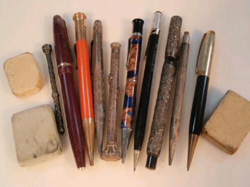 A collection of vintage propelling pencils including silver examples