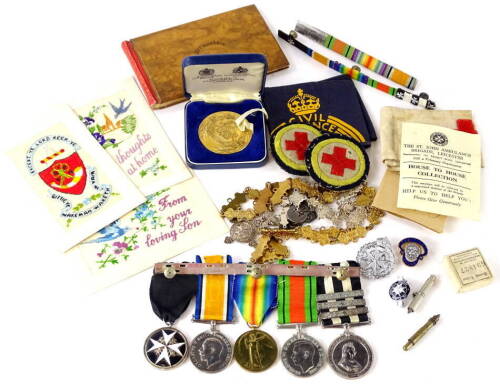 A collection of decorations and memorabilia relating to Private JW Marston of the Royal Army Medical Corps, number 21857, to include a First World War medal group comprising The Most Venerable Order of the Hospital of Saint John of Jerusalem, the 1914-18