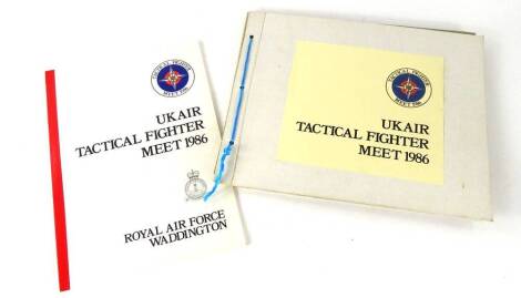 Two books related to the UK Air Tactical Fighter Meet in 1986, a programme and an album of photographs of aircraft.