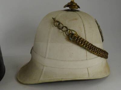 An officer's Buff helmet, in tin box marked C M King Esq, Argyll Southerland Hi., made by J B Johnstone of London. - 5