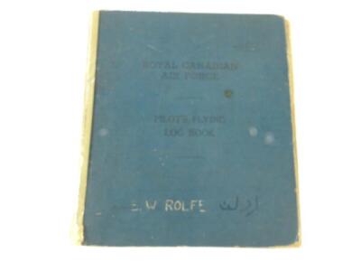 Flight Lieutenant E W Rolfe. RAF Service no. 157425, 20.5.1920 - 03.08.2007. An extensive record of WWII Service including pilot's log book, medals, Dog Tags, RAF Brevet and US Silver Wings, raid maps, service record, photograph albums, documents. Comp - 11