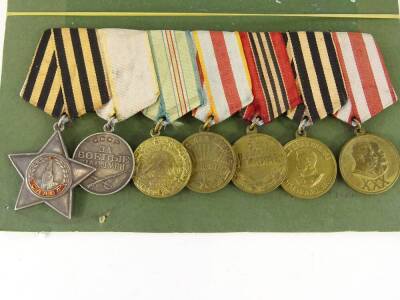 A Soviet Union Russian double gallantry medal group, order of glory and book. - 4