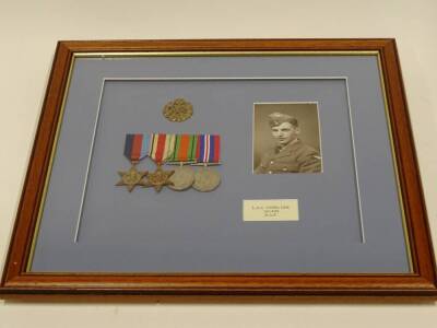 A display of medals and cap badge relating to L A C Cyril Lee 18149 RAF, framed and glazed. - 4