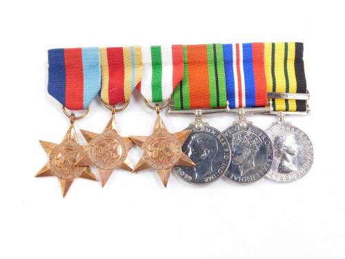 A set of late issued medals, similarly bearing marks to Mr D F Hartnoll-Hall RAF, issued circa 1995-96, comprising 1939-45 Star, Africa Star, Italy Star, Defence and War medals, together with the Africa General Service medal with Kenya clasp. Auctioneer'