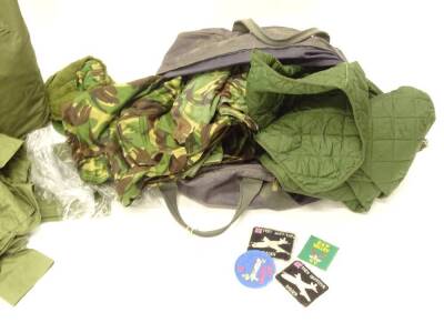 Two kits bags, together with various camouflage clothing, badges, etc. - 2