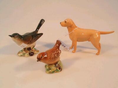 A Beswick figure of a Golden Labrador