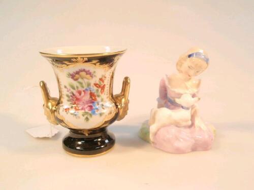 A Royal Doulton figure 'Mary Had a Little Lamb'