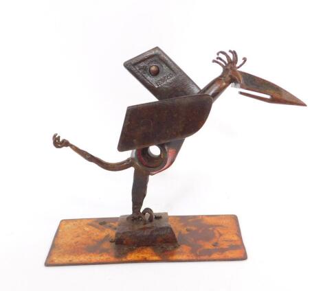 Andrew Thompson (British, 20th/21stC). A wrought iron sculpture of a pelican, modelled standing with a leg raised, raised on a rectangular base, signed and dated to base 2017, 33.5cm H, 43cm W.