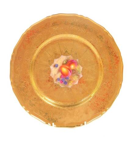 A Royal Worcester porcelain cabinet plate, circa 1958, painted by Freeman, with fruit, within a tooled gilt ground and border, printed mark, 27cm Dia.