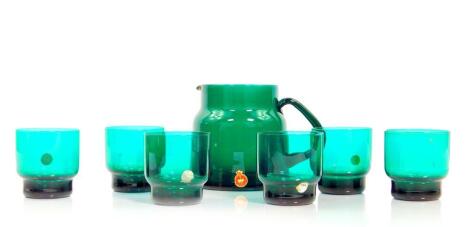 A late 20thC Holmegaard turquoise blue glass water set, comprising jug and six glasses. (7)