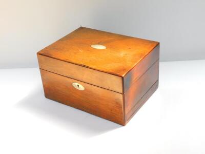 A Victorian rosewood travelling box with mother of pearl escutcheon, the hinged lid opening to reveal a fitted interior, with cut glass bottles and jars with cut glass stoppers or plated lids, together with a manicure set, to the side a semi secret drawer - 3