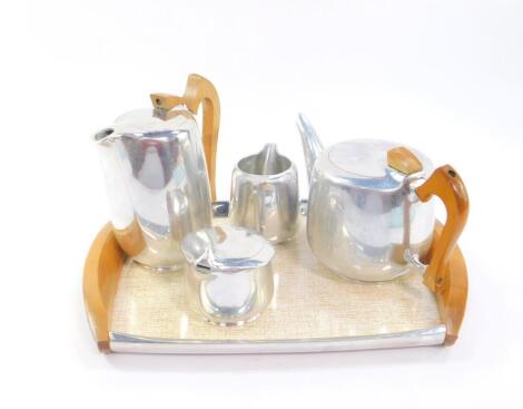 A Picquot ware five piece tea set, comprising twin handled tray, tea pot, hot water jug, cream jug, and sucrier.