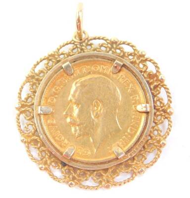 A George V gold half sovereign 1912, in a 9ct gold pendant mount, 7.0g.