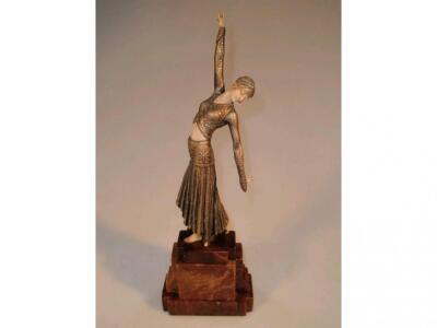 An Art Deco figure of a dancing girl in the style of Chiparus