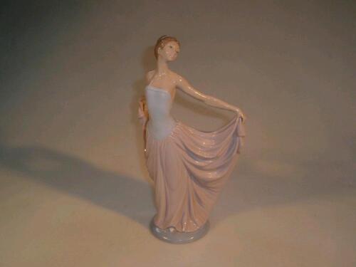 Lladro figure of a young woman in a ball gown