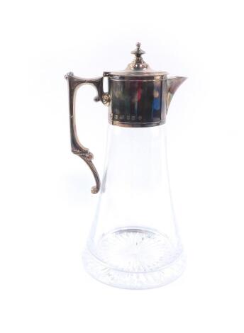 A cut glass claret jug, with silver mount, handle and hinged lid, London 2000, 27.5cm H.