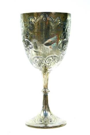An Edward VII silver agricultural trophy, embossed with roses and scrolling leaves, shaped reserve presentation engraved "Harmston Agricultural Show 1903 For the best cart mare, open to the Blankney Hunt Country, awarded to Albion Blackbird, the property 