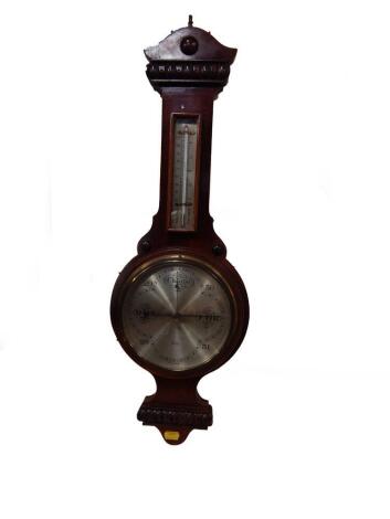 A 20thC mahogany cased wheel barometer by Mansell of Lincoln, with thermometer, 65cm H.