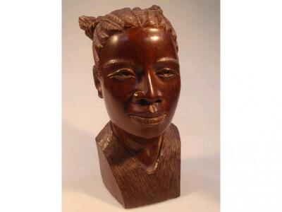 A Central African hardwood bust of a tribes woman