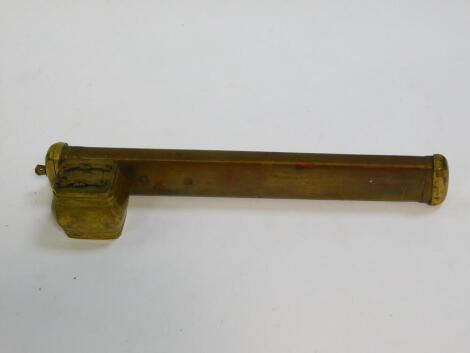 A 19thC Islamic brass scribe's pen case, with integral ink well, 25.5cm W.